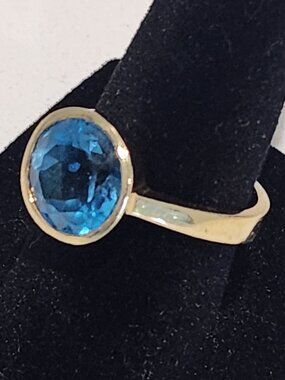 18 Carat London Blue Topaz Yellow Gold Bezel Solitaire Ring